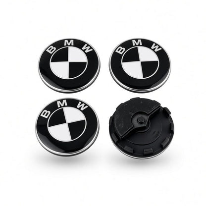 Black and white BMW floating centre caps, one shown from the back