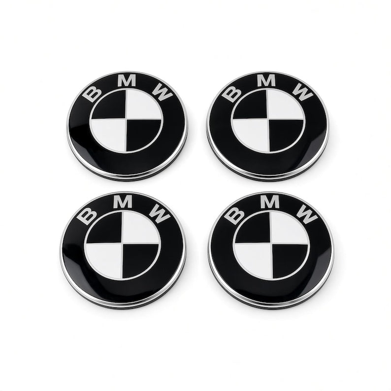 Four black and white BMW floating centre caps