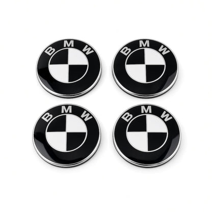 Four black and white BMW floating centre caps